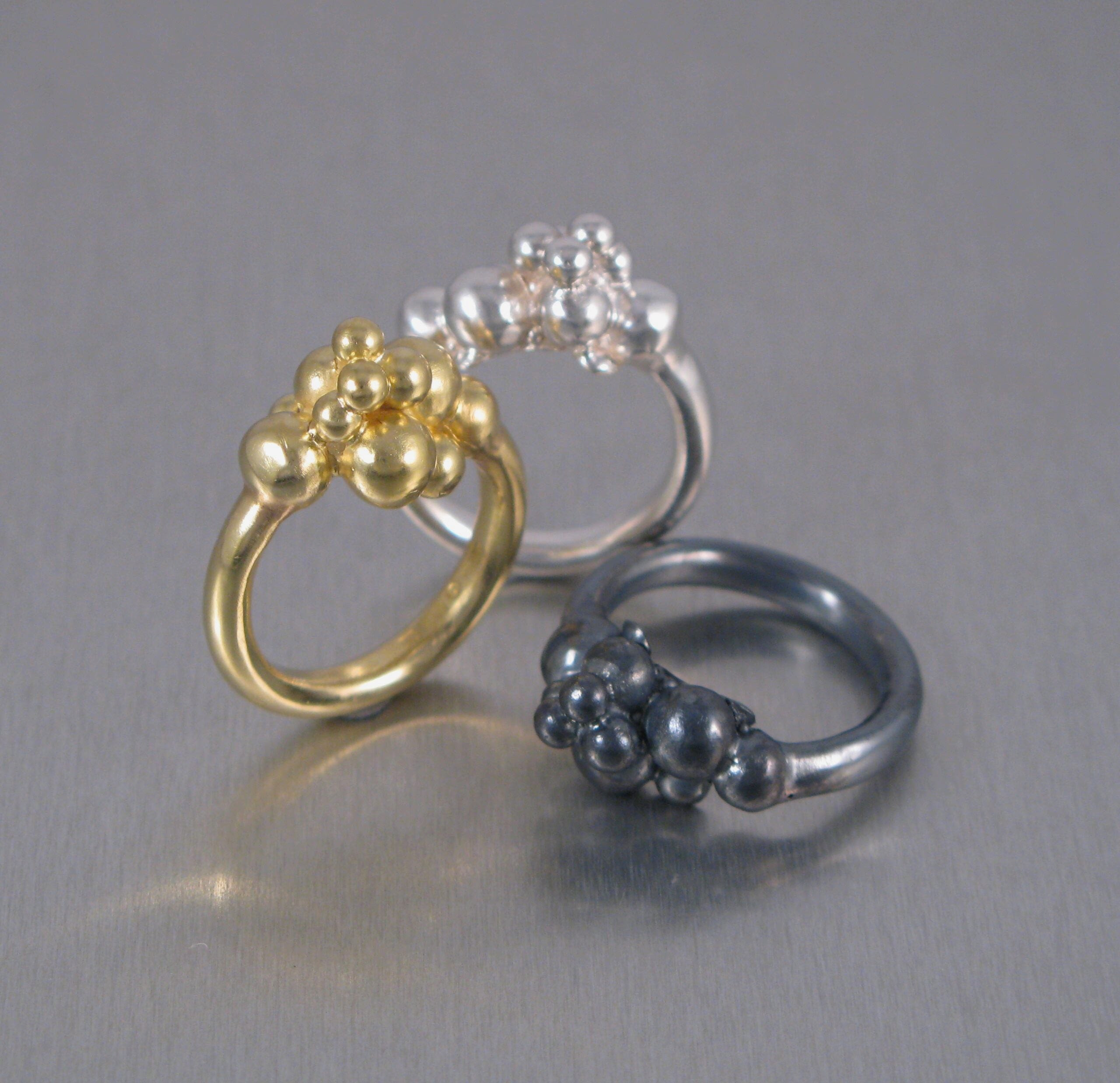 Ring, ”Kluster”, silver, guld och oxiderat silver.